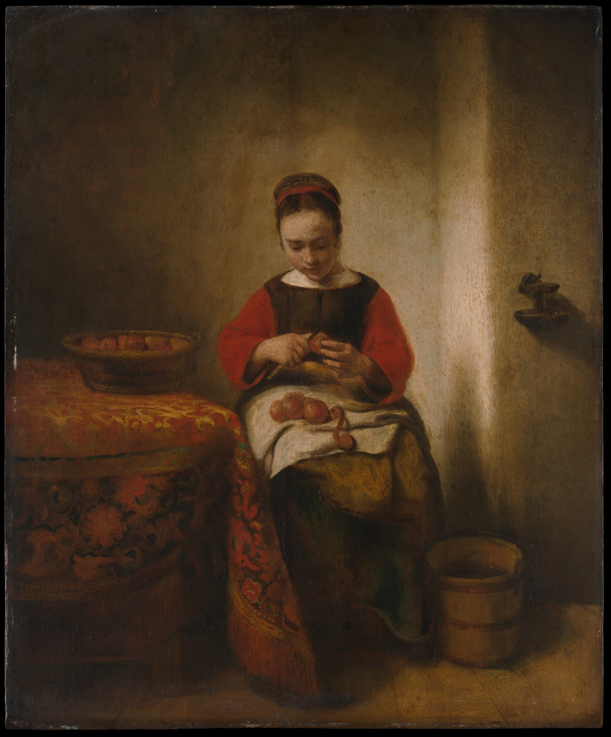 Young Woman Peeling Apples - Nicolaes Maes